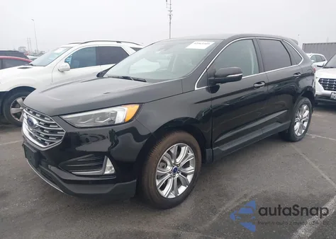 2022 Ford Edge Titanium z USA, uszkodzony, nr VIN 2FMPK4K96NBA53296